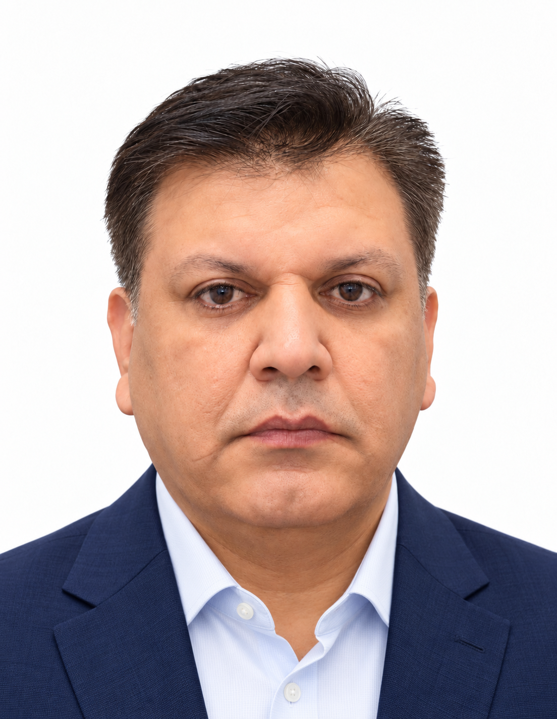 Yogesh Bhugra, Founder of YB Infra, wearing a formal navy-blue blazer